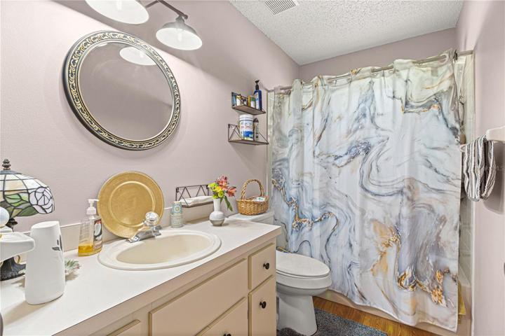 Hall/Gues Bath with Tub, Tile Surround, Comfort Height Toilet