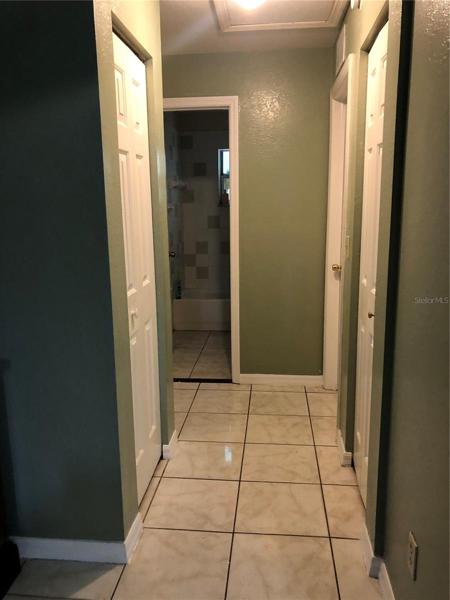 Hall to 2 of guest bedrooms and bath