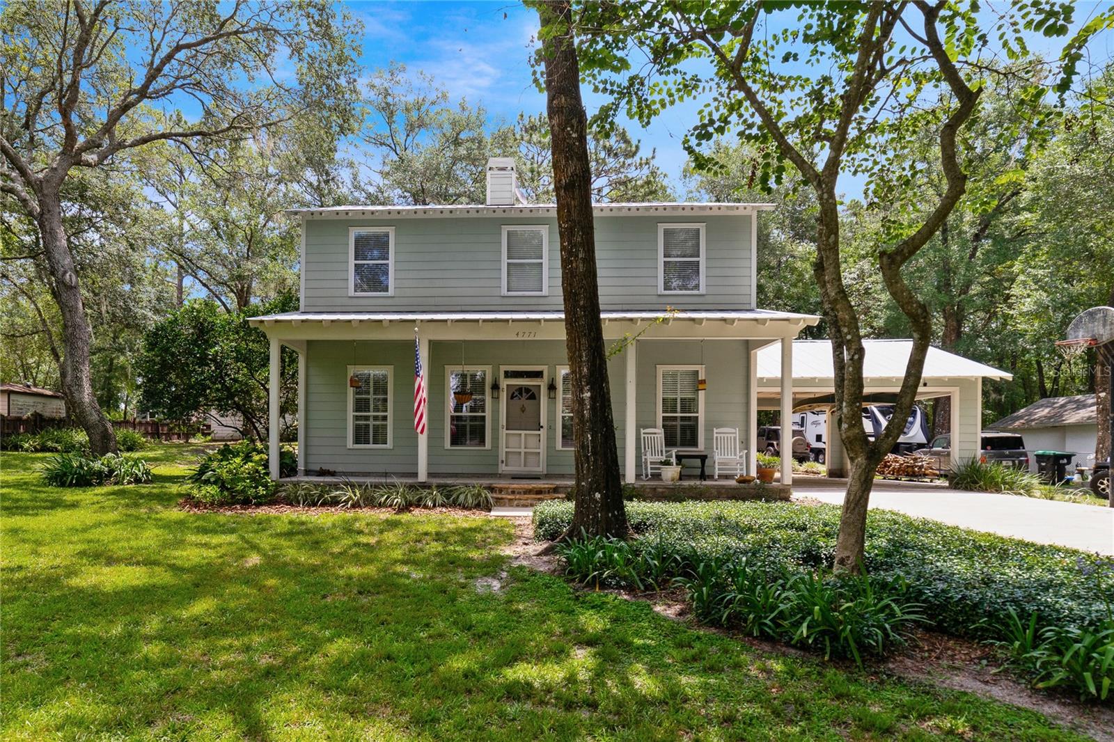 Custom built one owner home in the Rock Springs area of Apopka with a gorgeous KITCHEN and FAMILY ROOM REMODEL, tile/wood floors and crown molding throughout all on a sprawling 1/2 ACRE LOT with a detached GARAGE/WORKSHOP and 50/Year METAL ROOF!