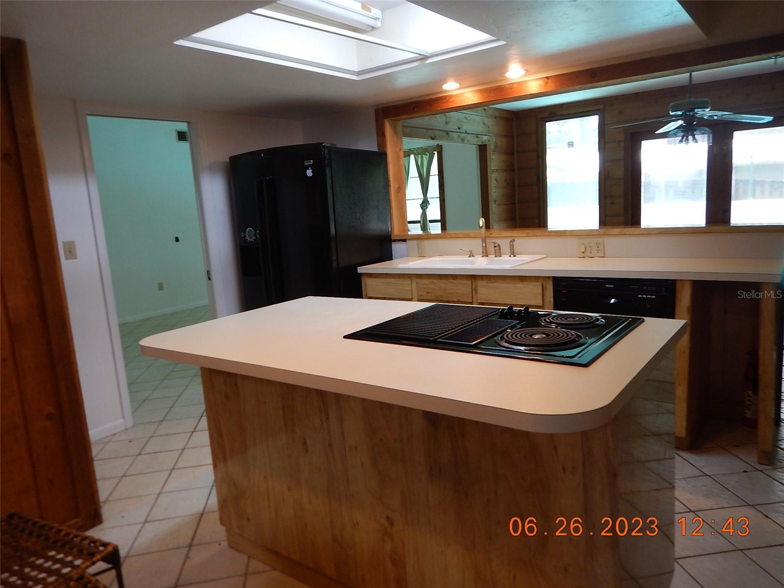 Kitchen looks out to the pool