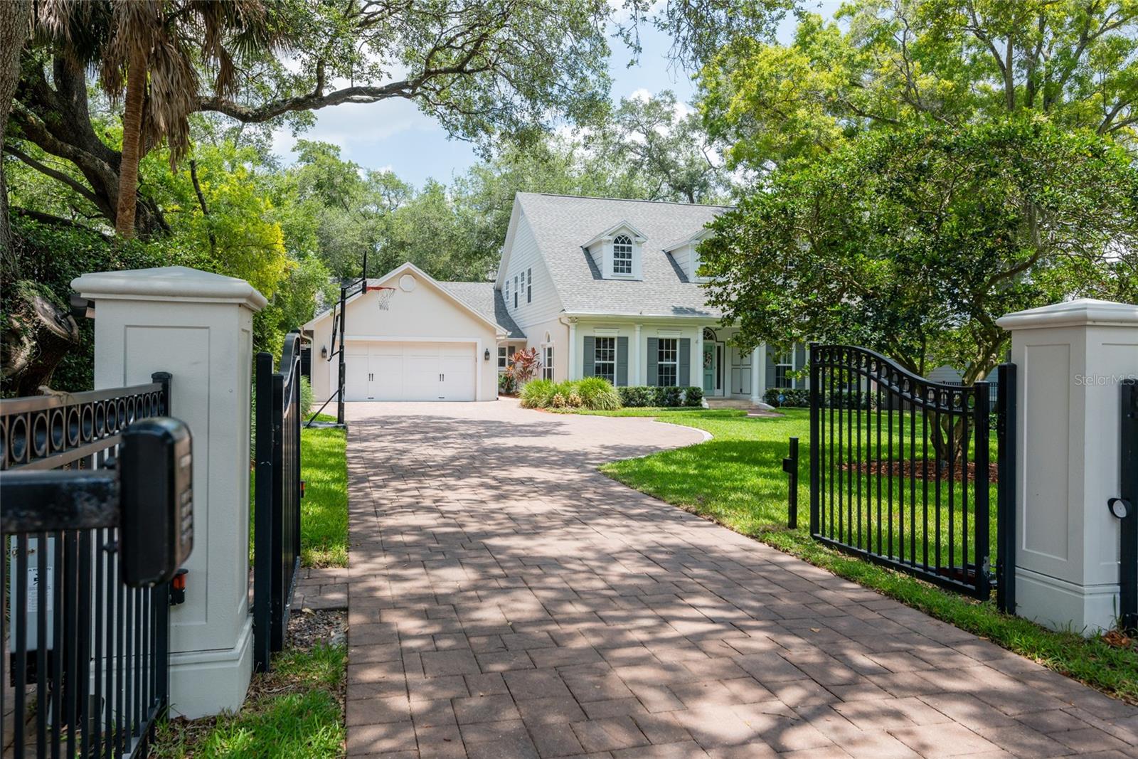 Private gated entry with fully fenced lot.