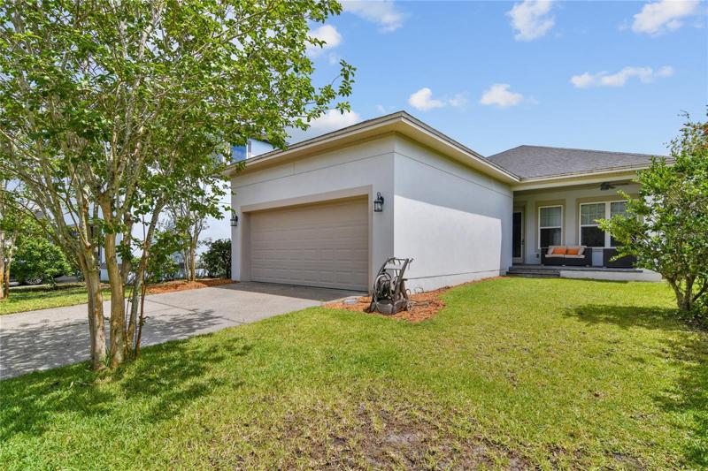 This 3-bedroom +office and 2-full bath home delivers tons of charm and curb appeal topped off with a large covered FRONT PORCH and REAR FACING 7’2” GARAGE (w/ access to a sizable attic with standing room!) with a full two car driveway!