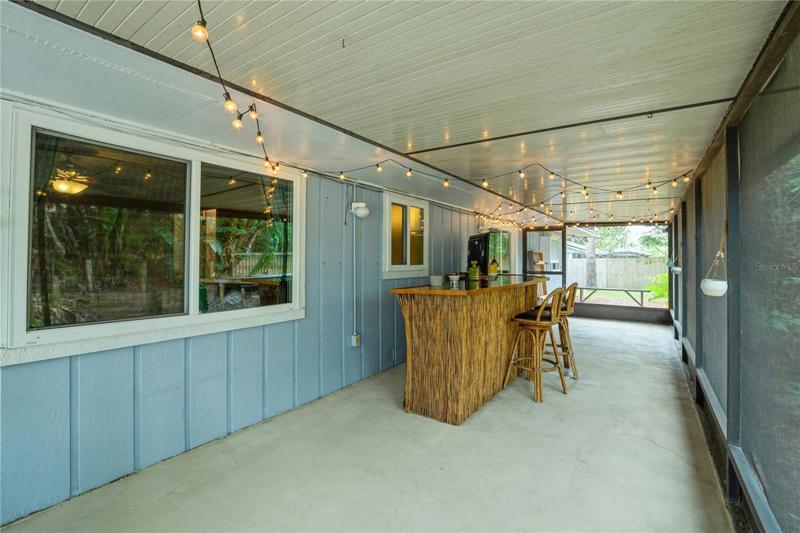 Back Screened in Porch with Tiki Bar