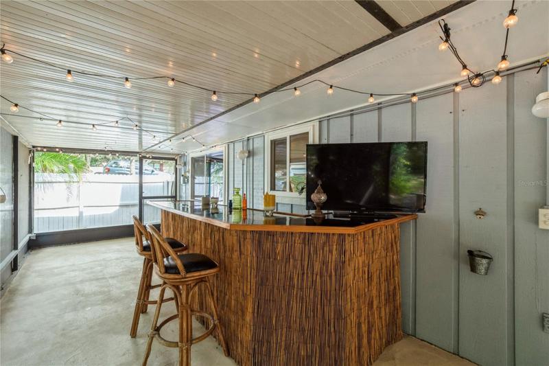 Screened in Porch with Tiki Bar