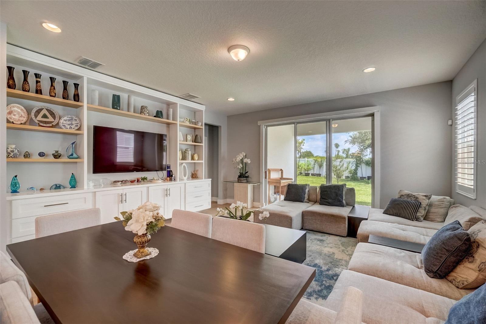 Immerse yourself in the epitome of refined elegance with a stunning living room wall unit that exemplifies luxury and sophistication. Meticulously curated with an investment of over $15,000, this exquisite piece of furniture stands as a true work of art, elevating your living space to new heights.Crafted with meticulous attention to detail and premium materials, this wall unit showcases impeccable craftsmanship and timeless design. Every element has been carefully considered, from the sleek lines and exquisite finishes to the functional storage solutions and seamless integration of modern technology.This exceptional investment transforms your living room into a haven of style and organization. The wall unit serves as a focal point, blending form and function effortlessly, providing ample storage for your entertainment essentials while showcasing your treasured possessions with grace.Prepare to be enchanted by the sheer beauty and sophistication of this living room wall unit, an extraordinary addit