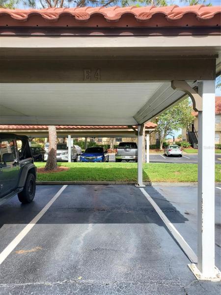 Covered Assigned Parking space in front of building