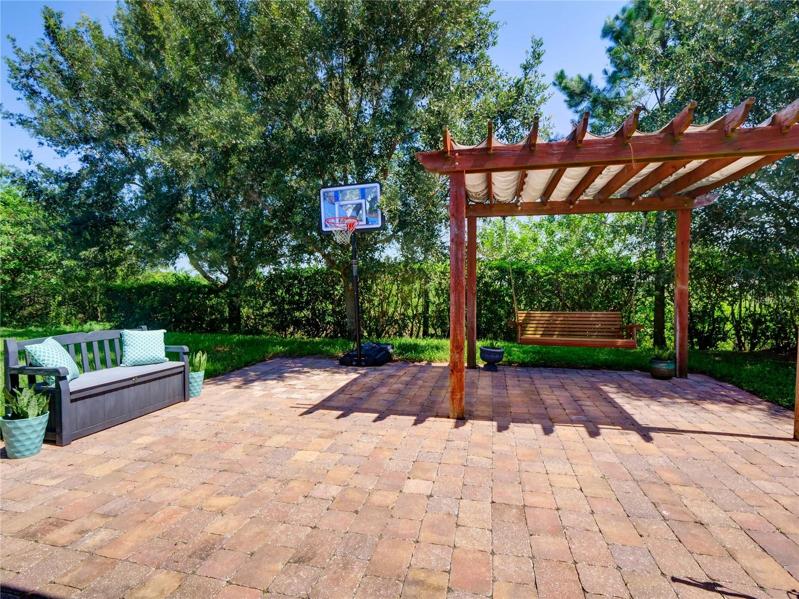 (19' x 23')  brick paved extended patio and Pergola