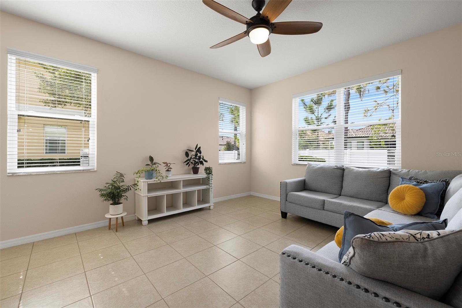Great Room with New Ceiling Fan and Tile Floor!
