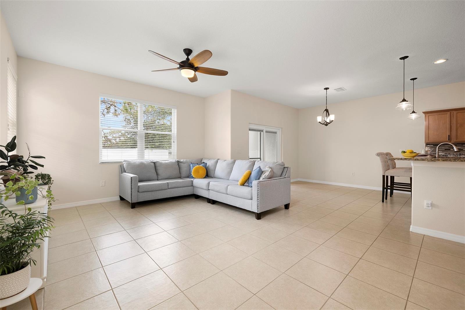 Great Room with New Ceiling Fan and Tile Floor!