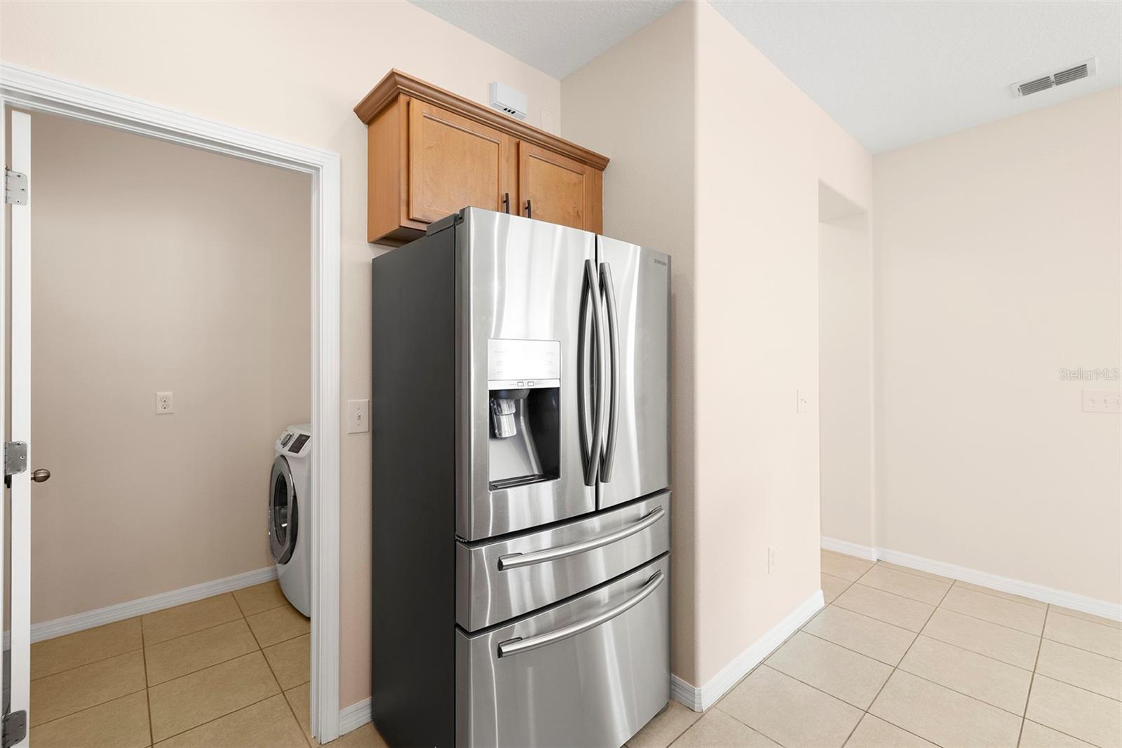 Laundry Room is a Dedicated Room that is off of the Kitchen!  Perfectly Placed to offer immense storage and convenience!