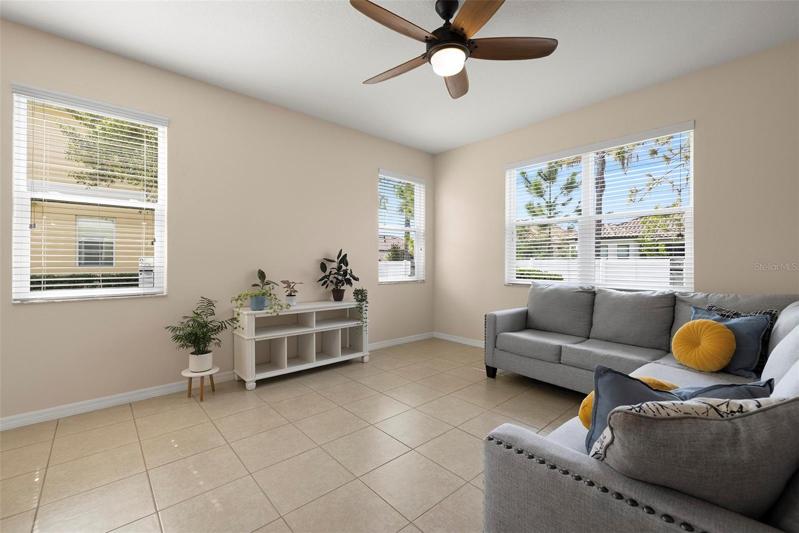 Great Room with New Ceiling Fan and Tile Floor!
