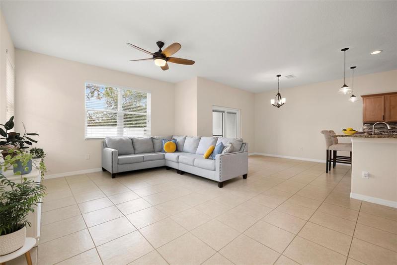Great Room with New Ceiling Fan and Tile Floor!