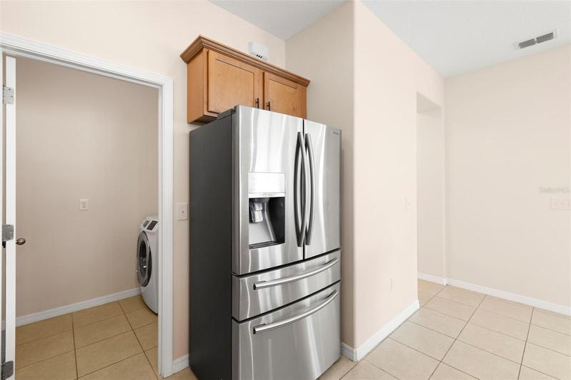 Laundry Room is a Dedicated Room that is off of the Kitchen!  Perfectly Placed to offer immense storage and convenience!