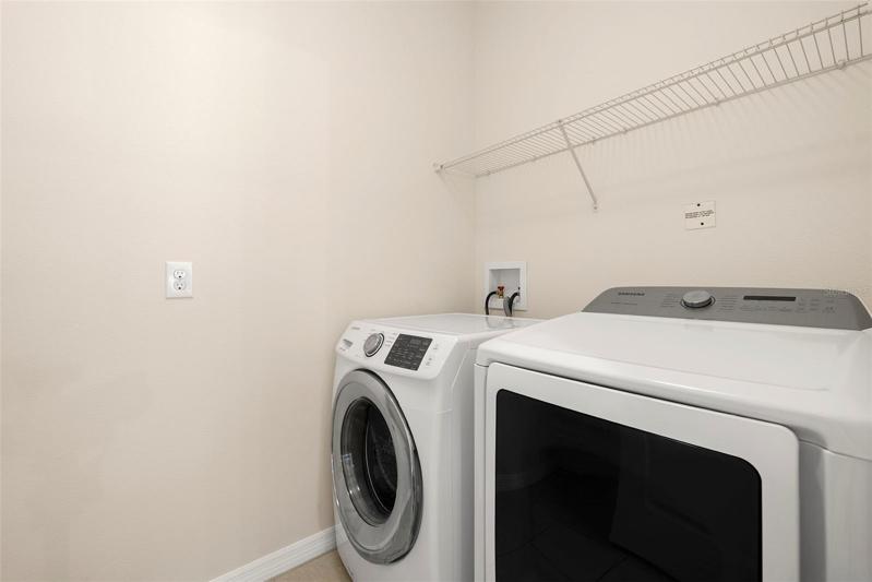 Dedicated Laundry Room with Newer Washer and Steam Dryer!  Yes it is staying!