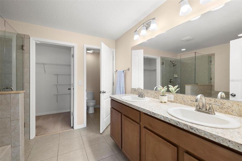 Master Bathroom with Dual Sinks with large Granite Counters!  The Walk in Closet makes this Completely Wonderful!