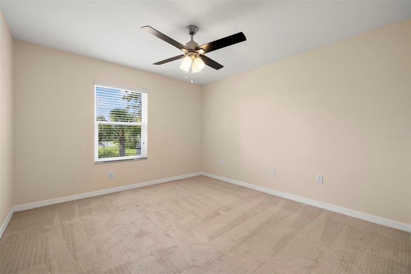 Bedroom 3 with New Pella Windows and New Ceiling Fan!