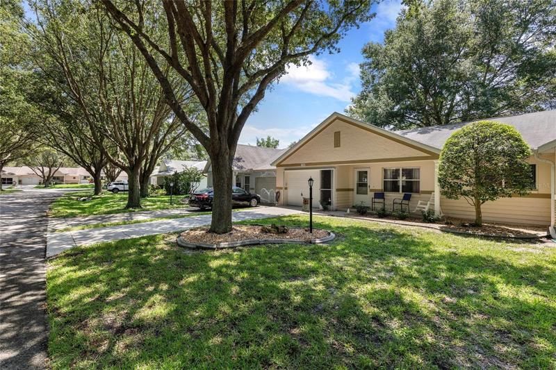 Front of home showing Tree Lined Street