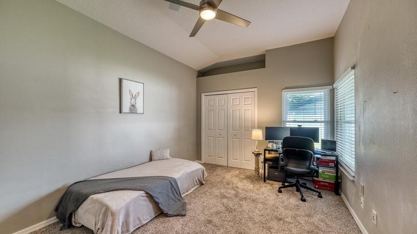 third bedroom / guest room joins guest bath and with access to backyard