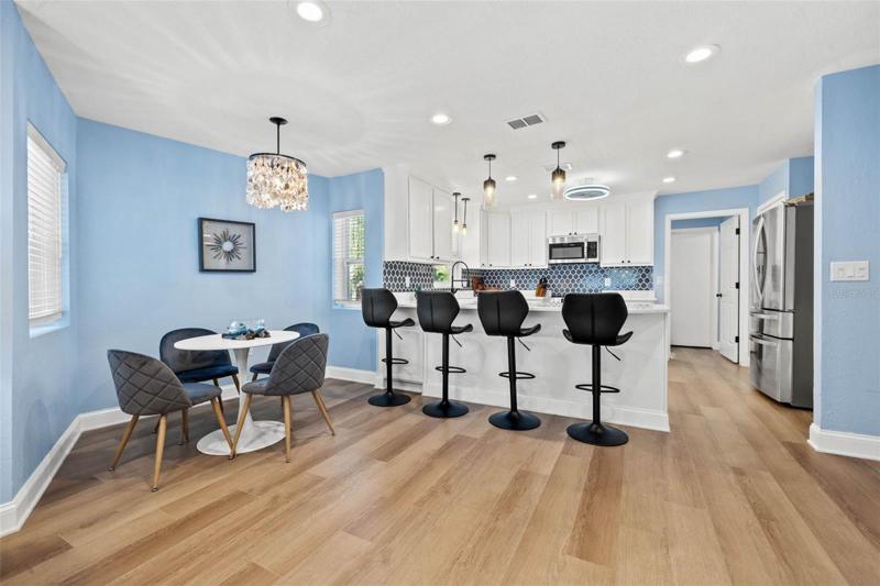 Breakfast nook and bar space to entertain family and friends.
