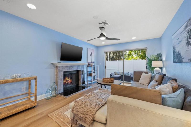 directly off the kitchen is the den and patio space.
