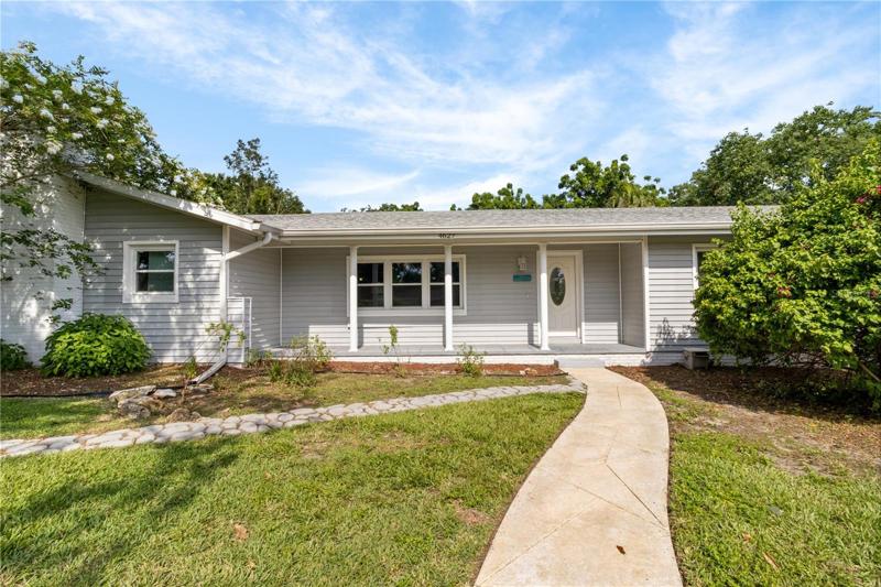 Front porch-perfect for rocking chairs and dual walkways to front door