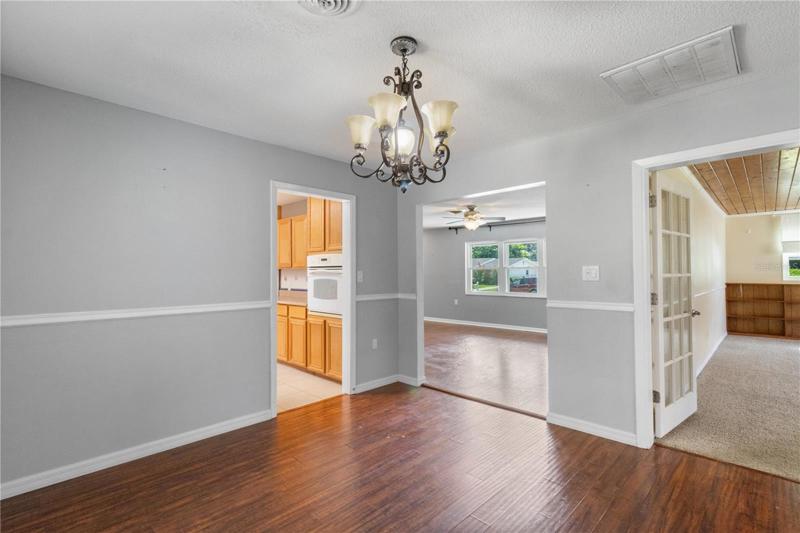 View from formal dining room (Kitchen, living room and family room)