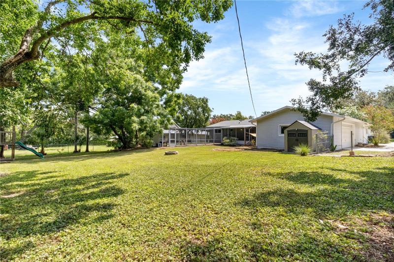 Large back yard. partially fenced