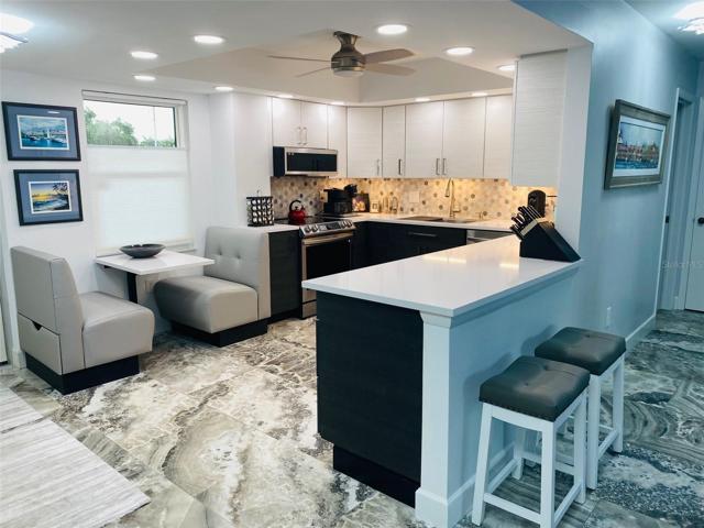 PLENTY OF ROOM FOR EVERYONE TO COMFORTABLY PREP AND COOK IN KITCHEN