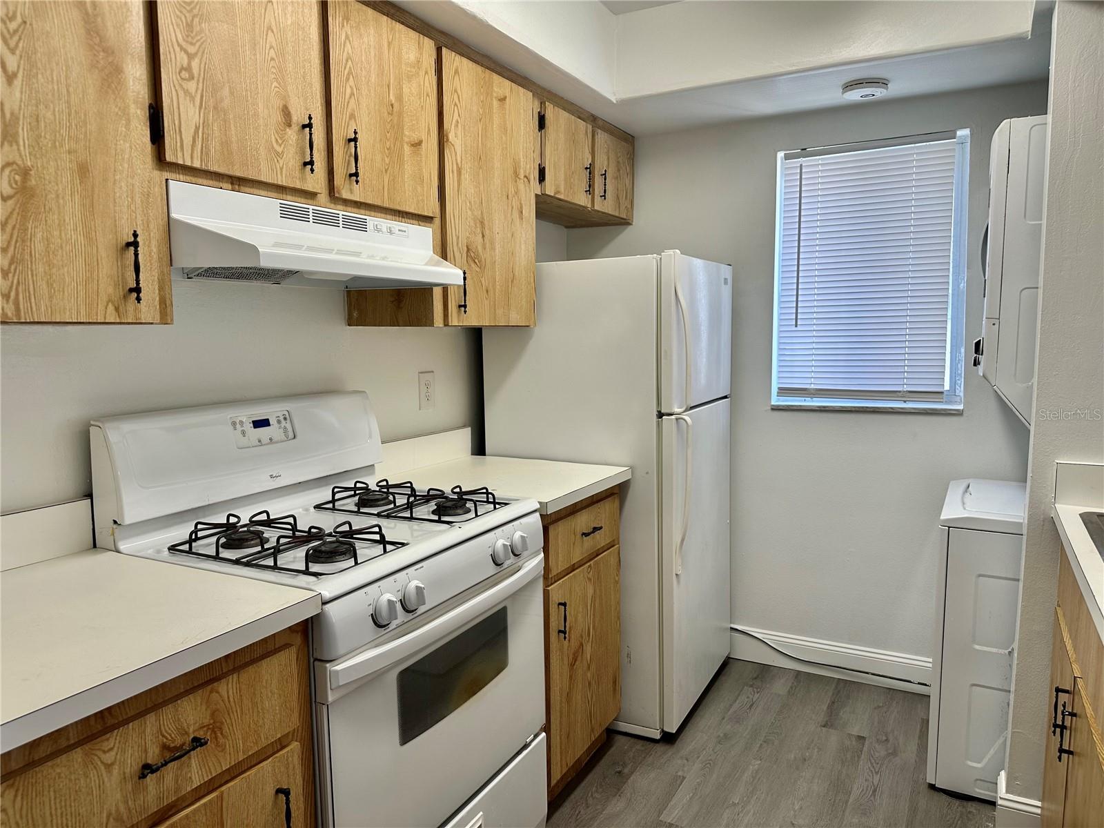 Stackable washer/dryer in kitchen