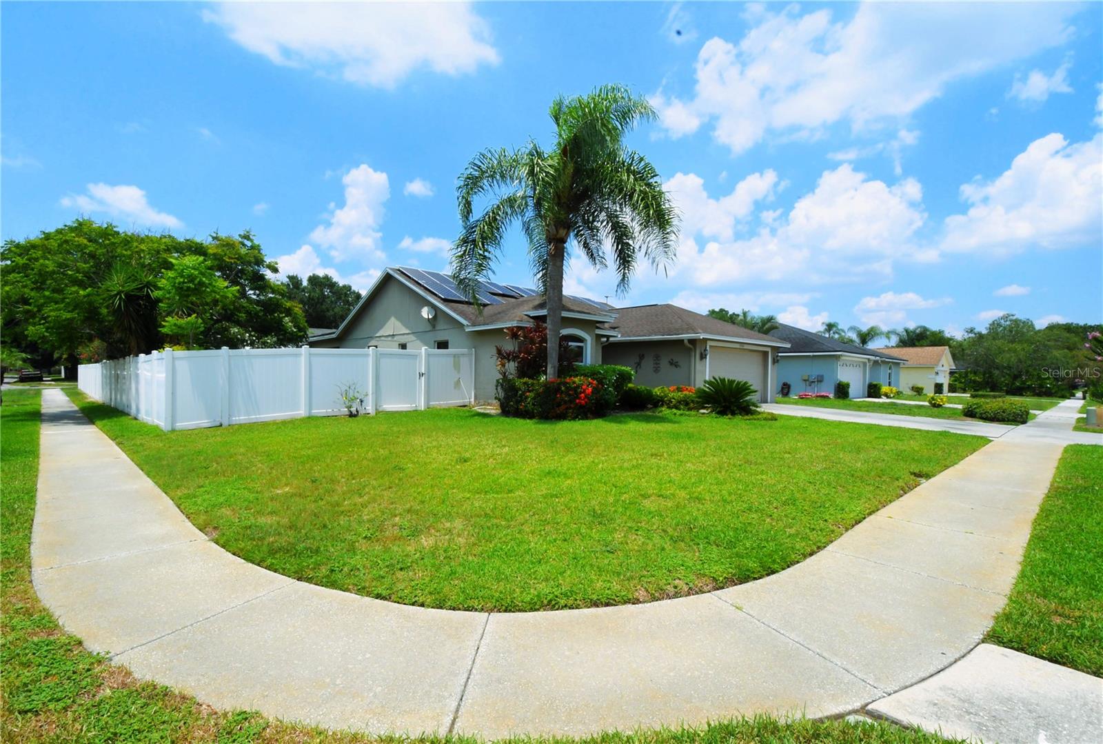 Beautifully manicured corner lot.