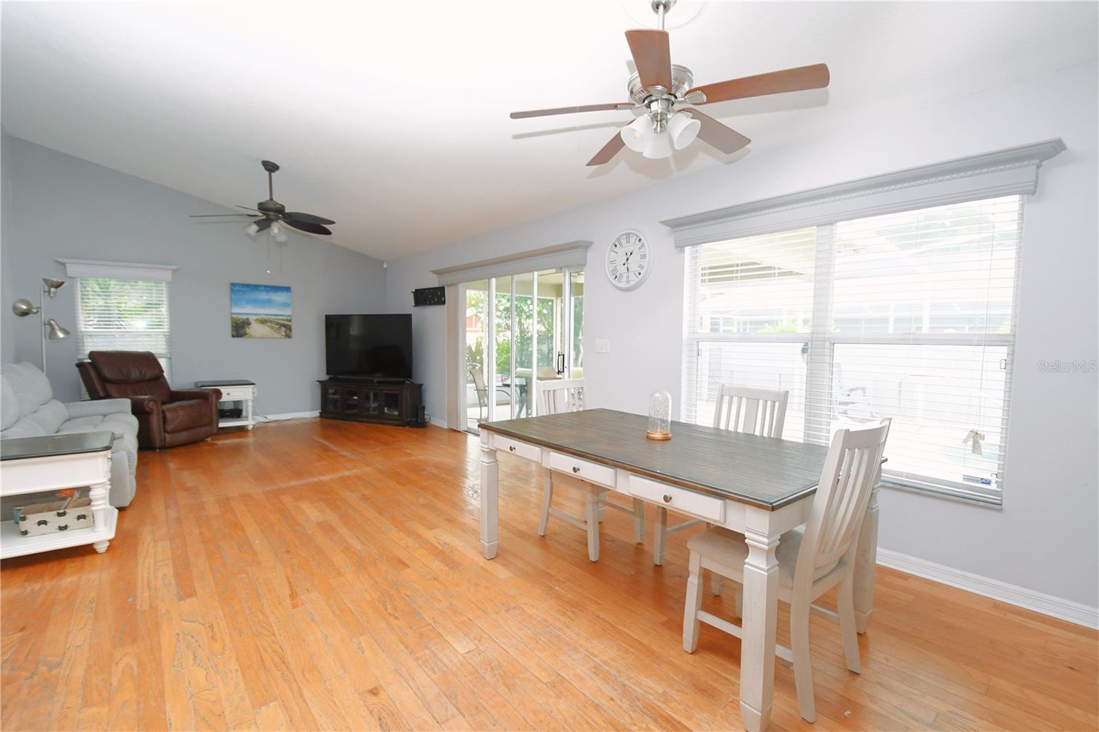 The dining and family room are ideal for entertaining in this open floor plan.