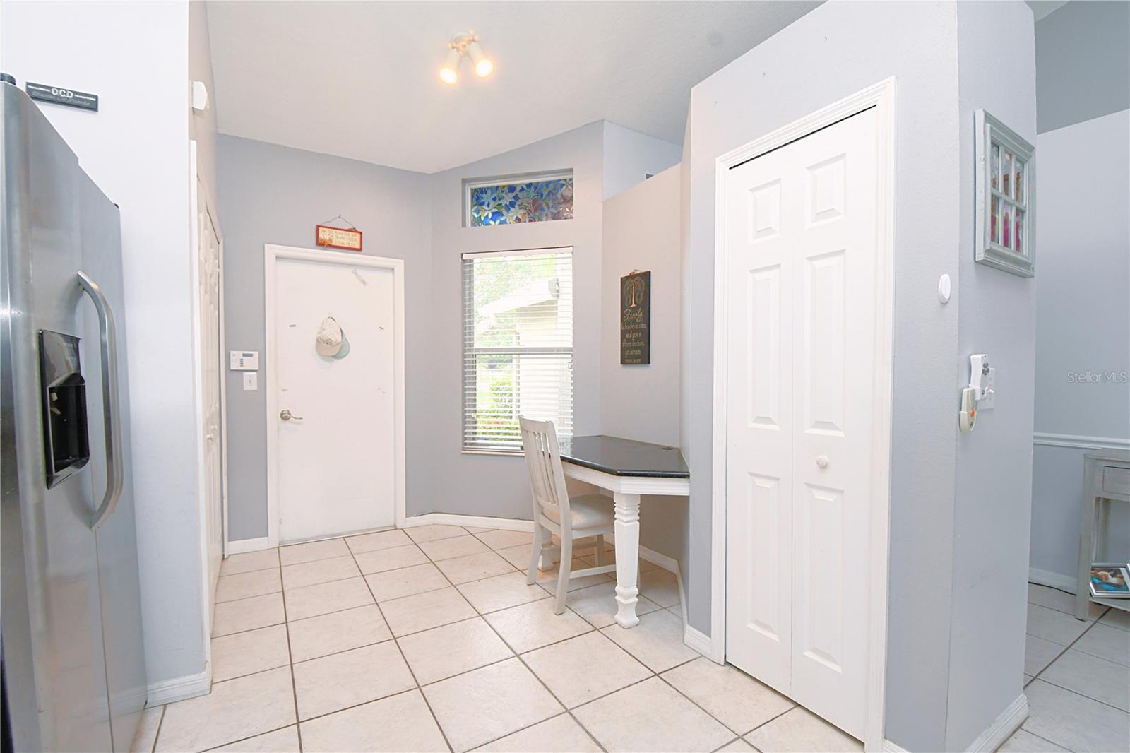 The kitchen features a closet pantry and a cozy breakfast nook.