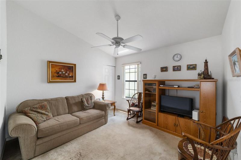 office/den with large walk-in closet