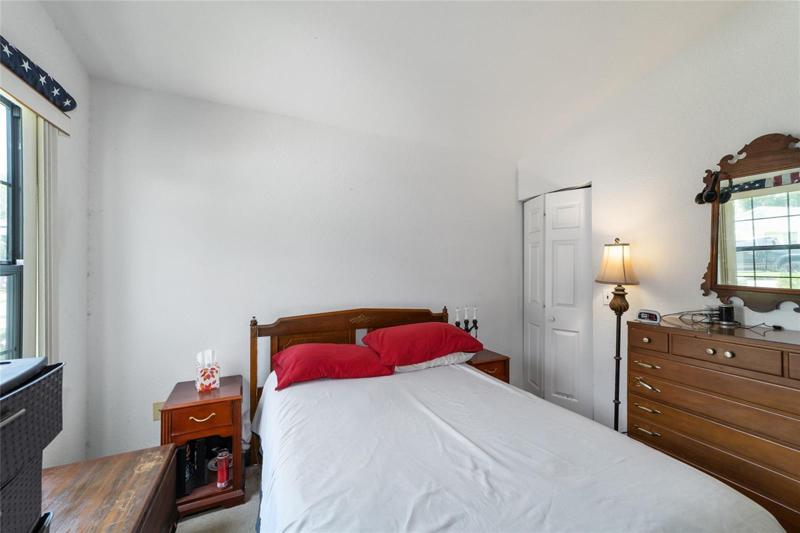 Guest room with walk-in closet