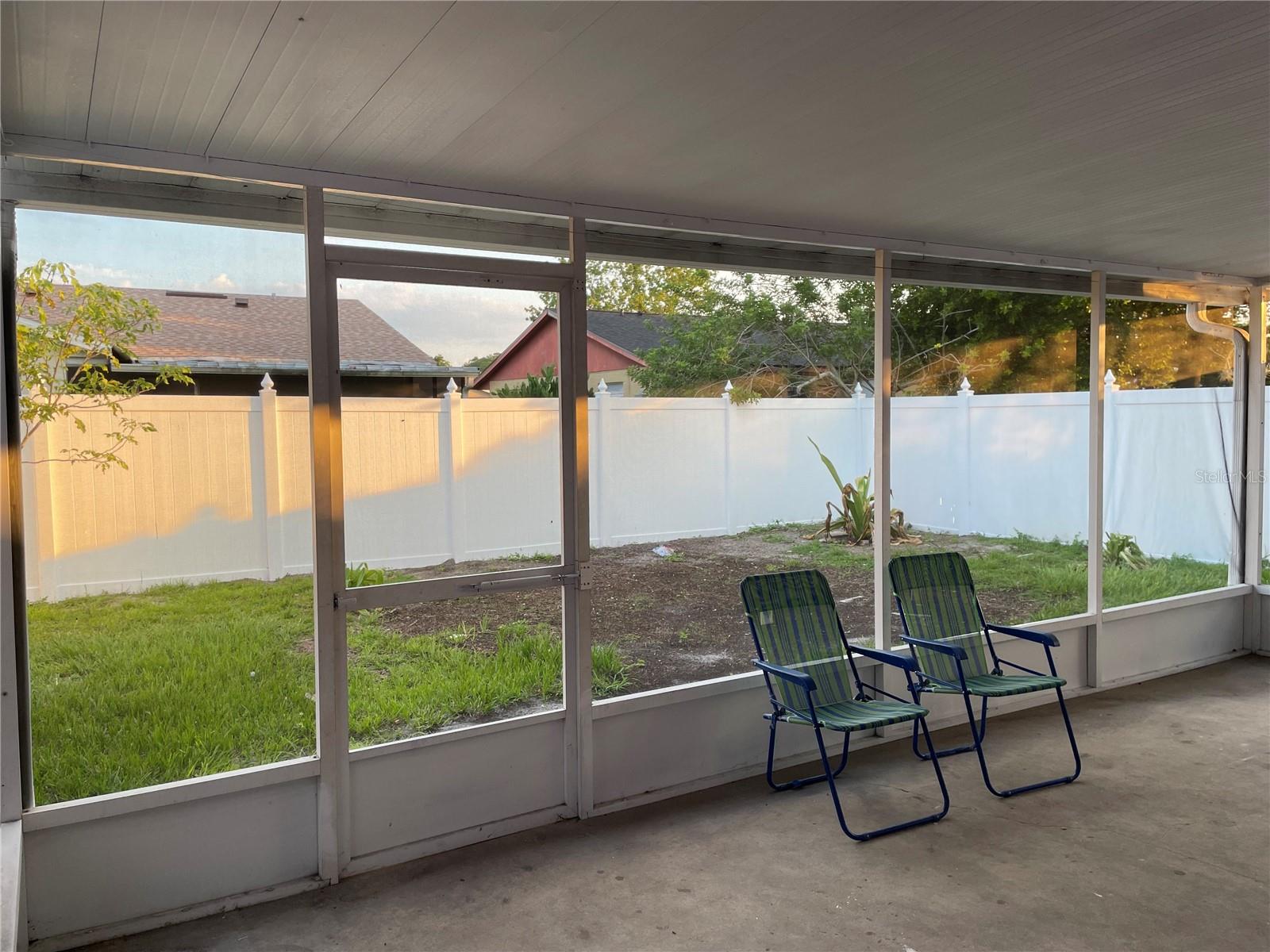 Large covered and screened porch patio