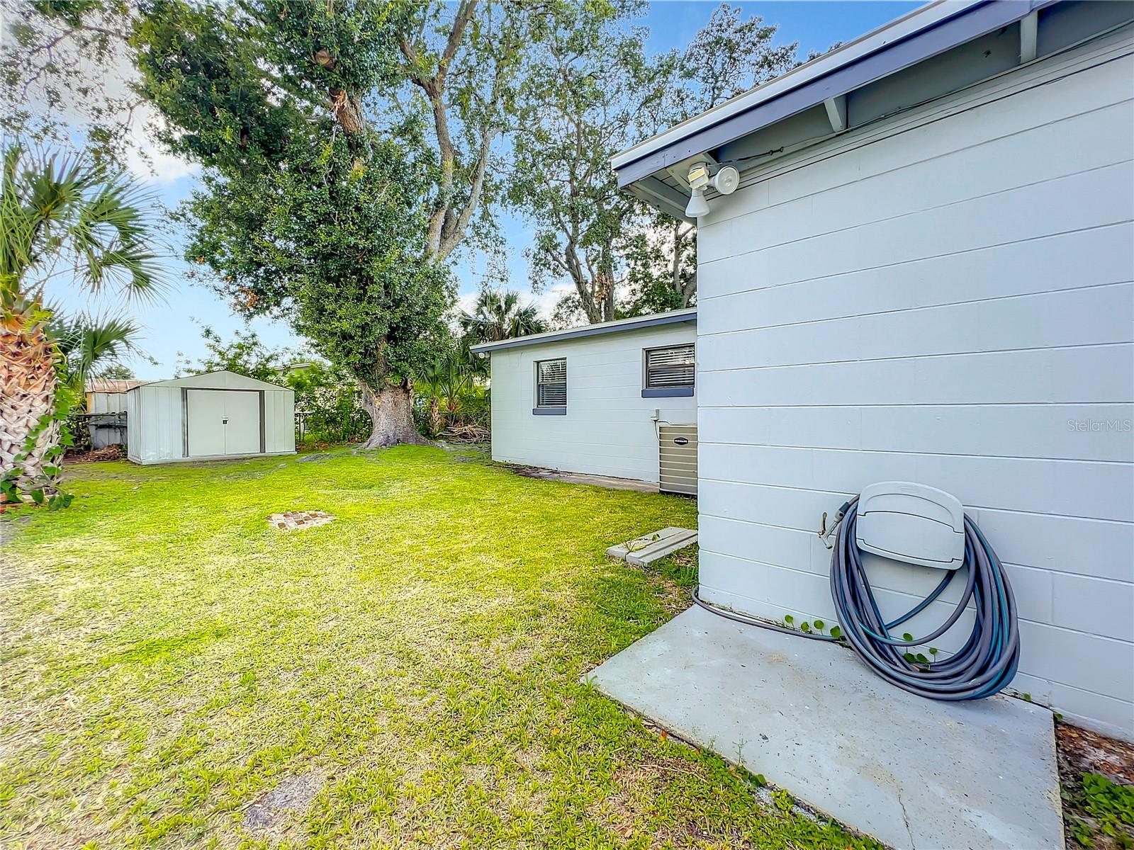 BACKYARD WITH STORAGE SHED