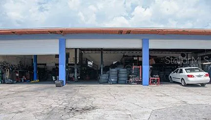 3 large overhead garage doors