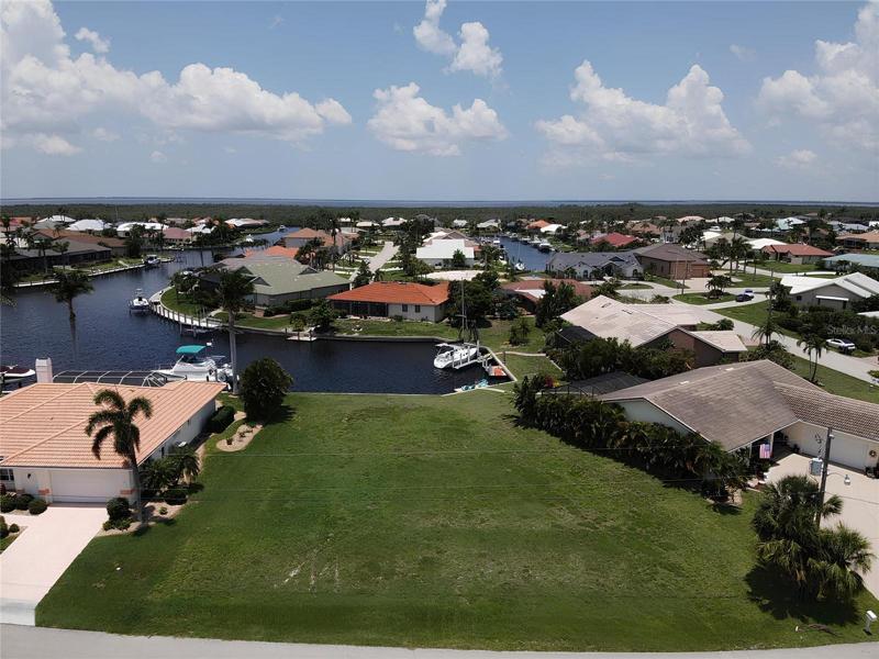 Prime waterfront PGI lot.  No bridges to harbor.