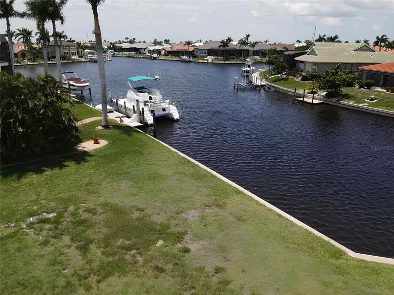 Back of the lot shows interacting canal.