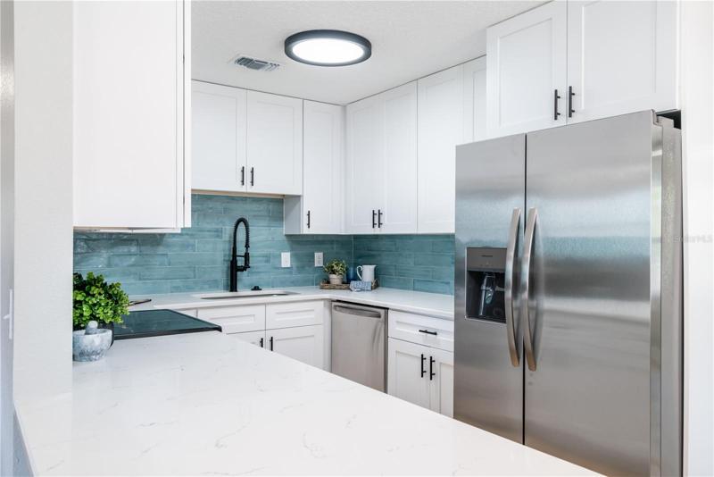 Beautifully Renovated Kitchen with new cabinets and appliances