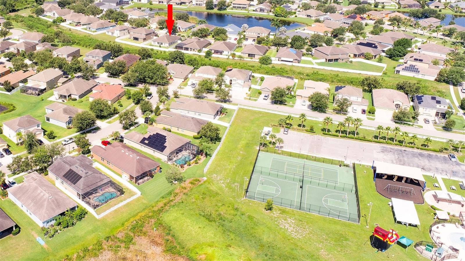 View of TENNIS and BASKETBALL COURTS and PLAYGROUND.