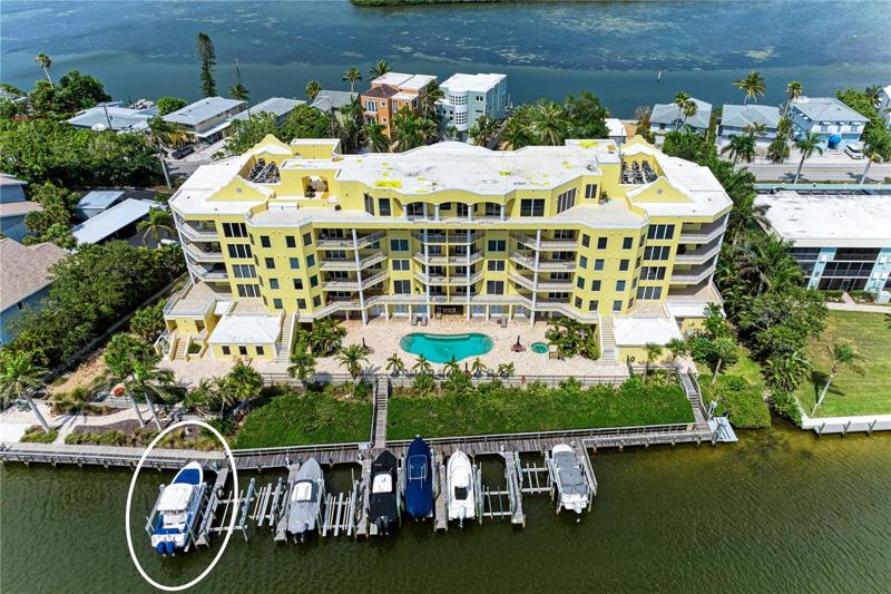 Aerial of rear condo water views.  Assigned boat dock #1 is circled