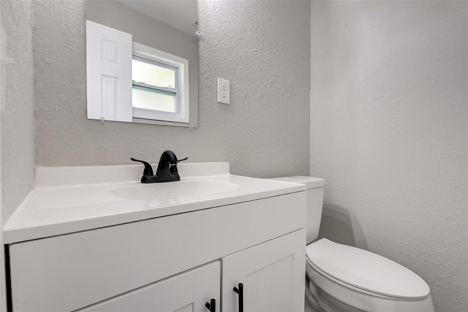 Private master half bath
