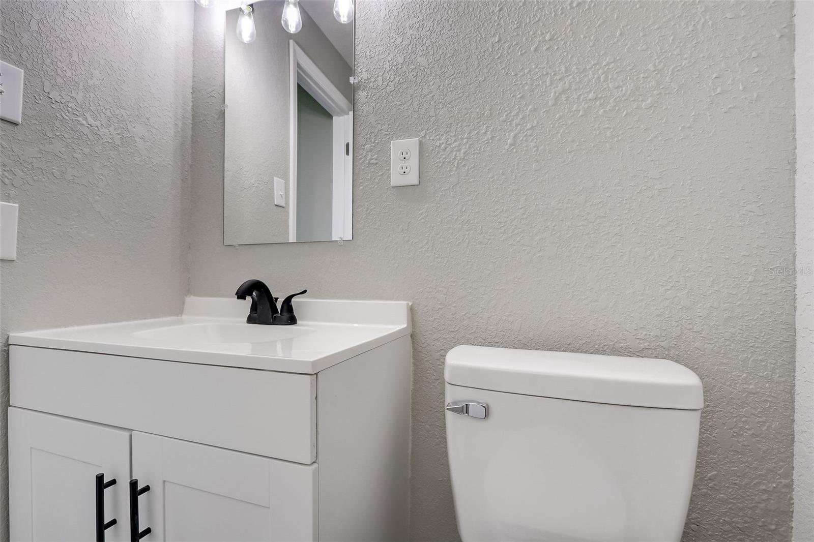Private master half bath