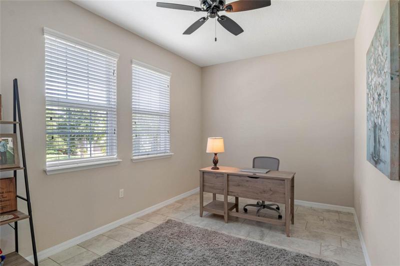 Spacious Den currently used as an office