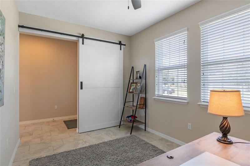 Custom Barn Door allows for pricvacy whe needed...allowsthis to be a great 3rd br,craft area or study