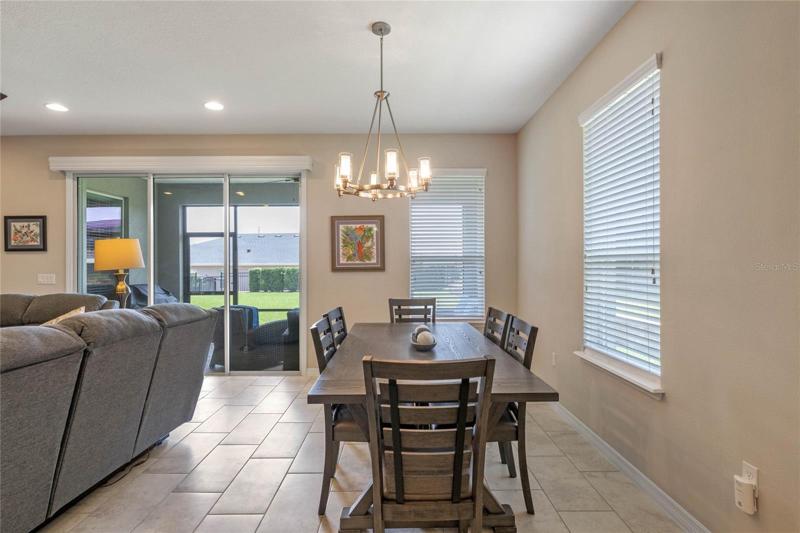 SEPARATE DINING SPACE AND TRIPLE SLIDERS TO LANAI