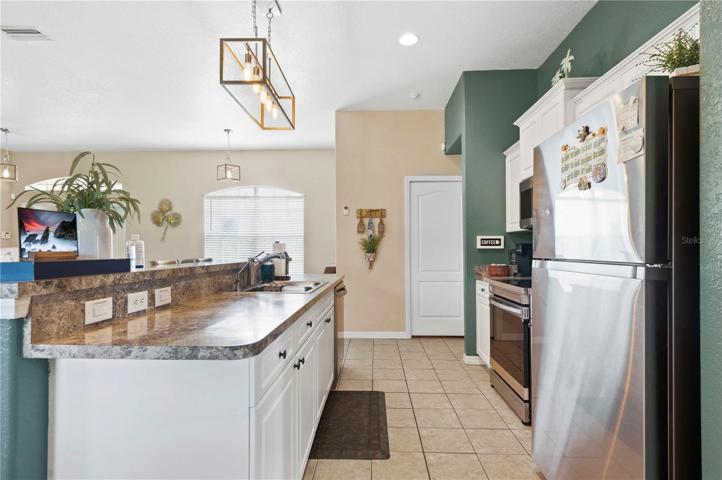 Kitchen leading to laundry room