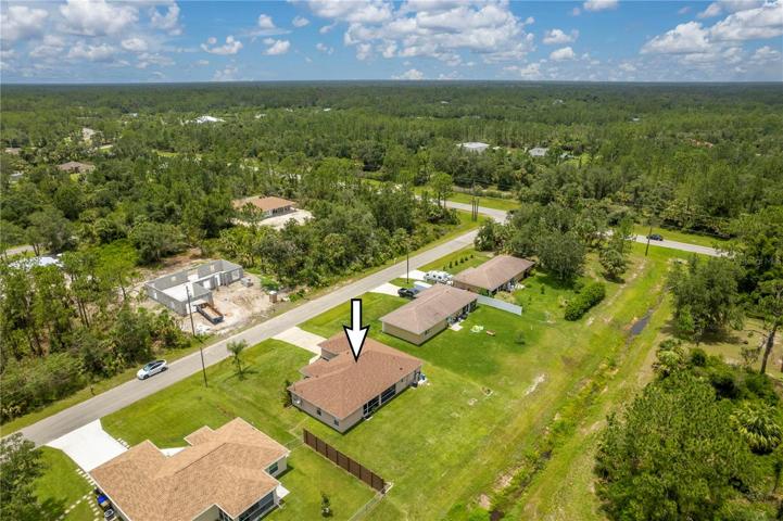 New construction directly across the street, great location.  North Port Estate homes (top of photo, acreage homes)