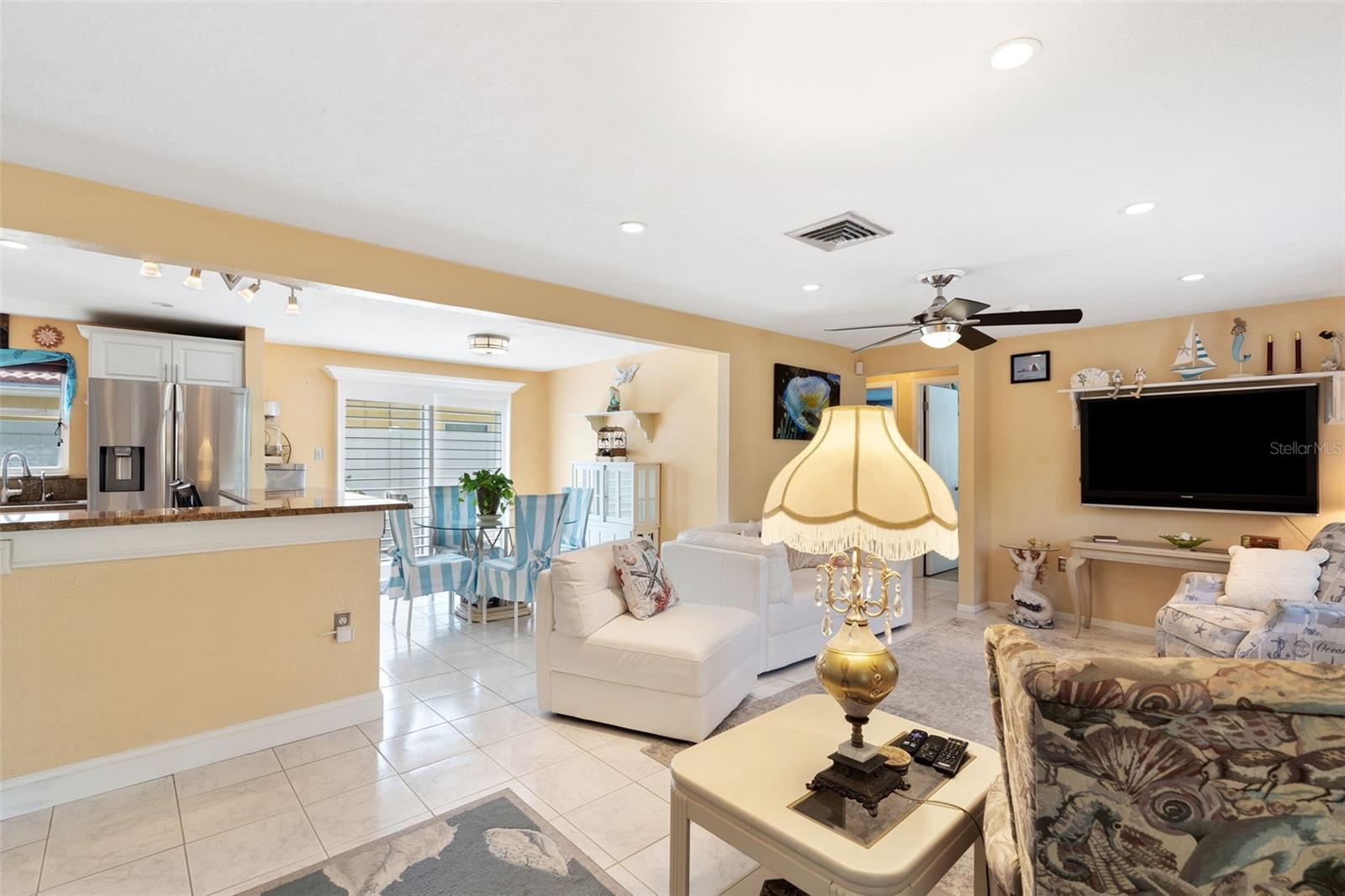 From the front door, enter into the living room and kitchen for an open floor plan.